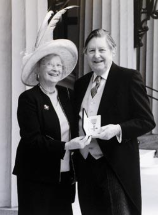 Dr John Harcup and wife Mary collecting OBE at Buckingham Palace in 2008. Dr Harcup was chairman of Malvern Spa Association for many years