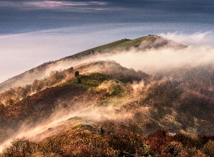 Malvern Spa Association card F cloude rolling up the Malvern hills
