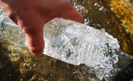 Water collection at Evendine spring (photo by Jan Sedlacek @Digitlight)