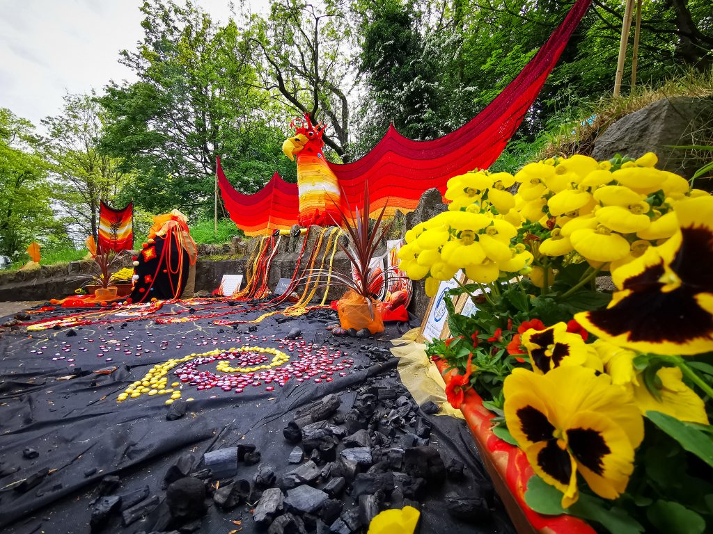 Stocks fountain decorated with a large knitted phoenix