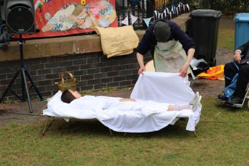 Demonstration of the Water Cure - being wrapped